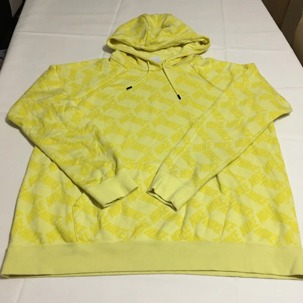 Nike Sportswear Essentials Pullover Hoodie Womens XL Yellow All Over Print Logo